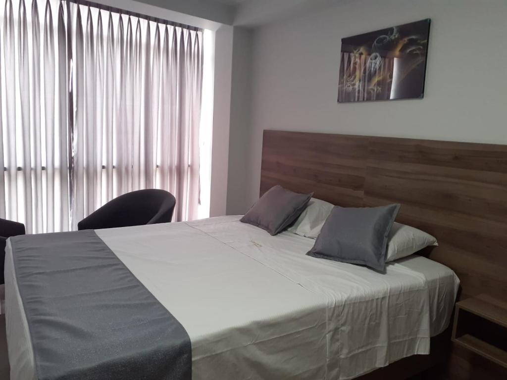 Postel nebo postele na pokoji v ubytování Hotel Terrazas Del Mar