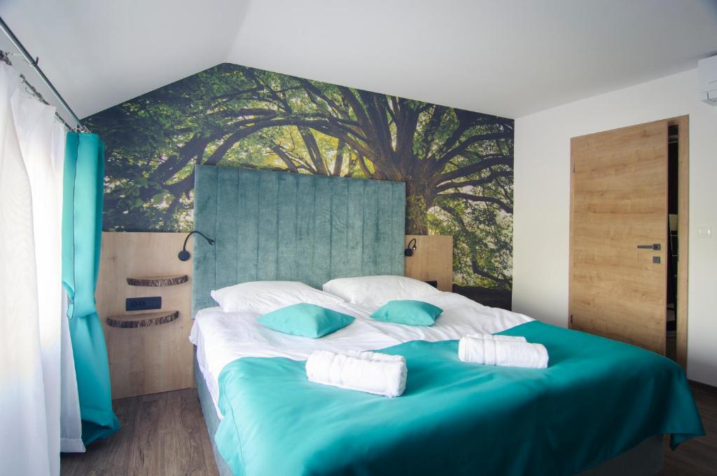 Postel nebo postele na pokoji v ubytování Apartments with Private Saunas & WELLNESS Gobi