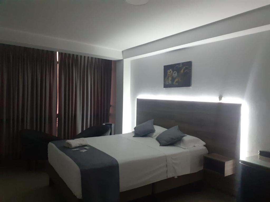 Postel nebo postele na pokoji v ubytování Hotel Terrazas Del Mar
