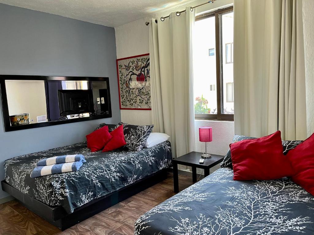 Postel nebo postele na pokoji v ubytování Caribbean apartment