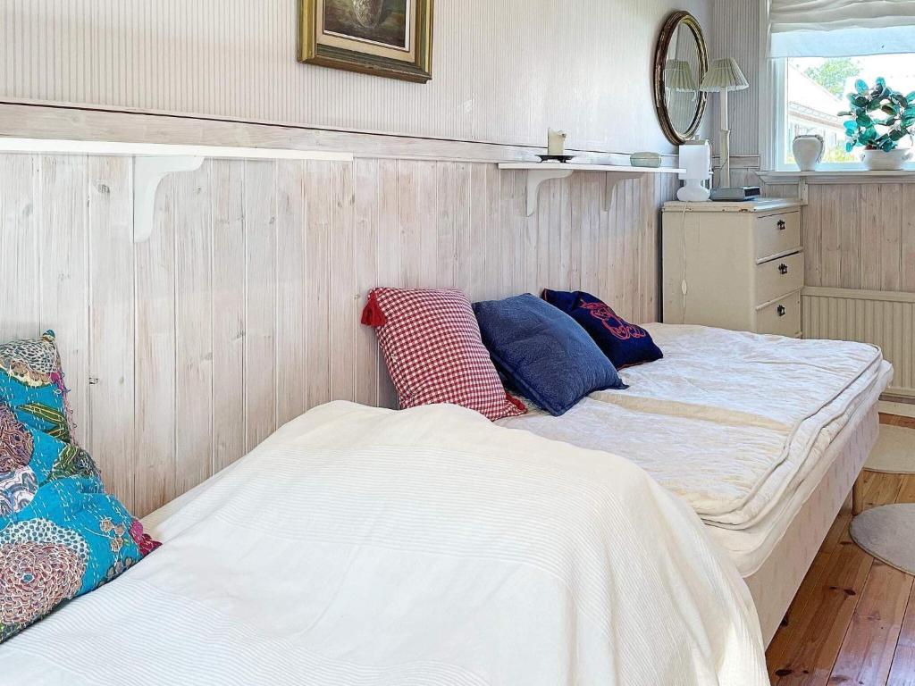 Postel nebo postele na pokoji v ubytování Holiday home ELLÖS IX