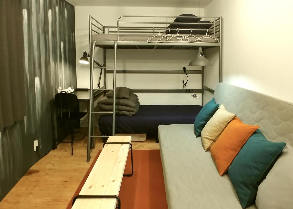 Postel nebo postele na pokoji v ubytování BENCH