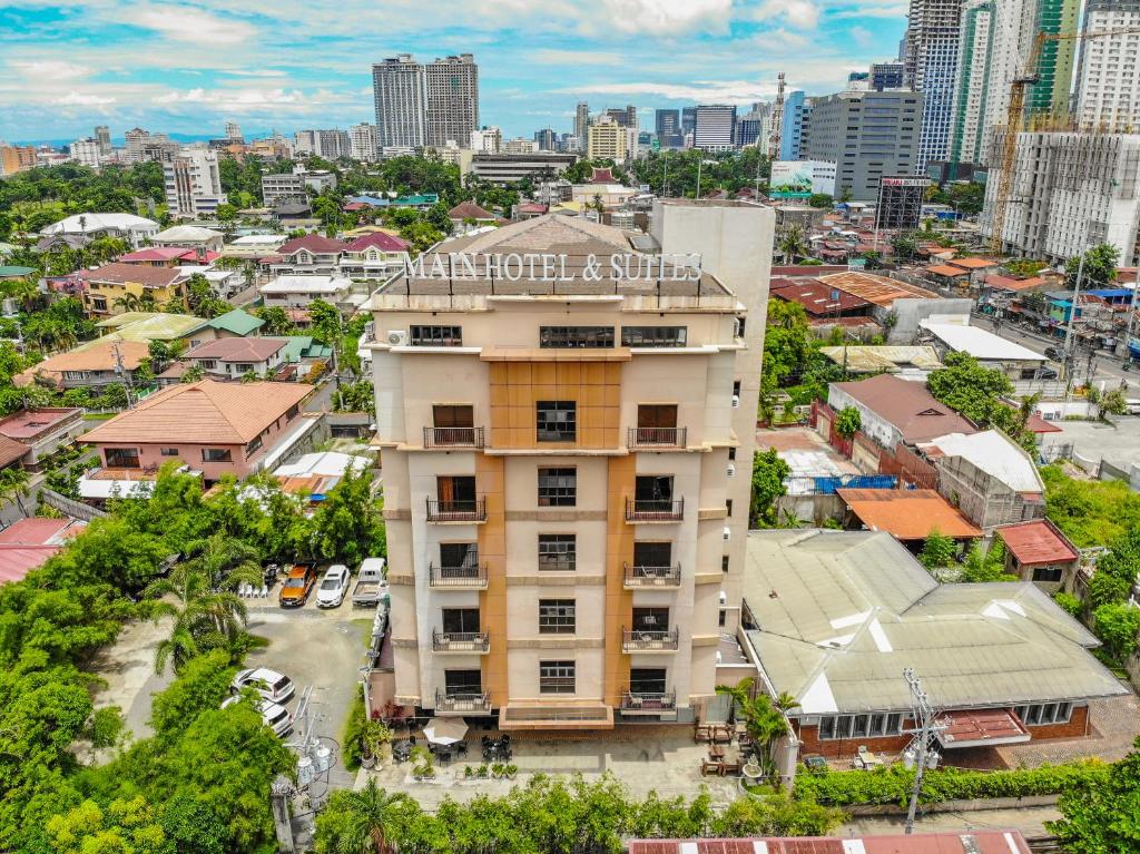 an overhead view of a building in a city at Main Hotel & Suites in Cebu City