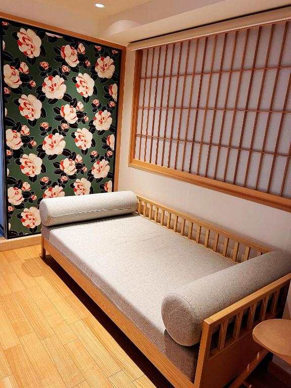 Postel nebo postele na pokoji v ubytování Nplus Tokyo Akihabara Premium