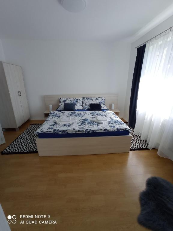 Postel nebo postele na pokoji v ubytování Apartman JulRich