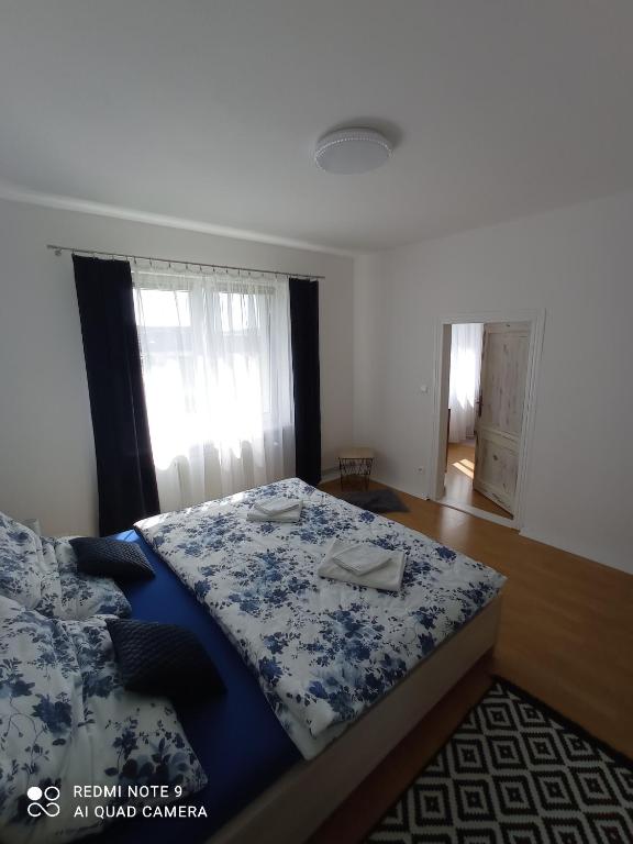 Postel nebo postele na pokoji v ubytování Apartman JulRich