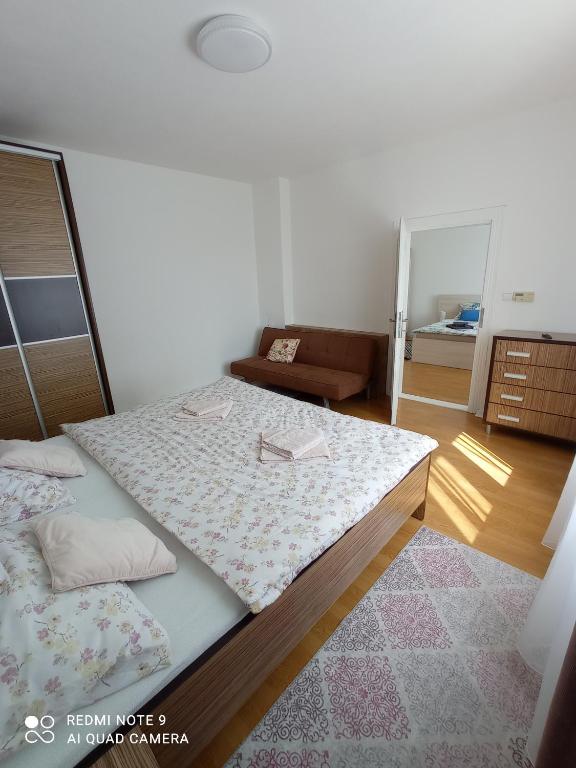 Postel nebo postele na pokoji v ubytování Apartman JulRich