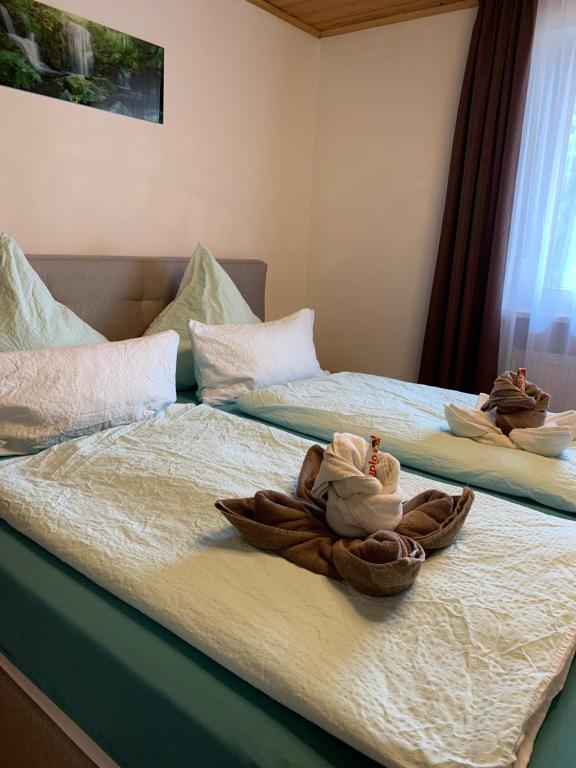 Postel nebo postele na pokoji v ubytování Pension Kleiner
