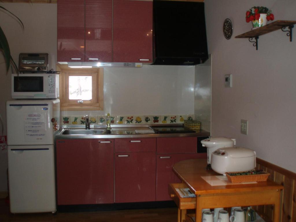 Kuchyň nebo kuchyňský kout v ubytování La Posada