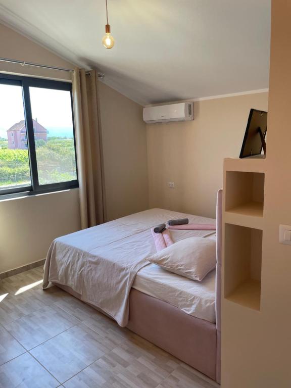 Łóżko lub łóżka w pokoju w obiekcie Hotel Villa Ballkan