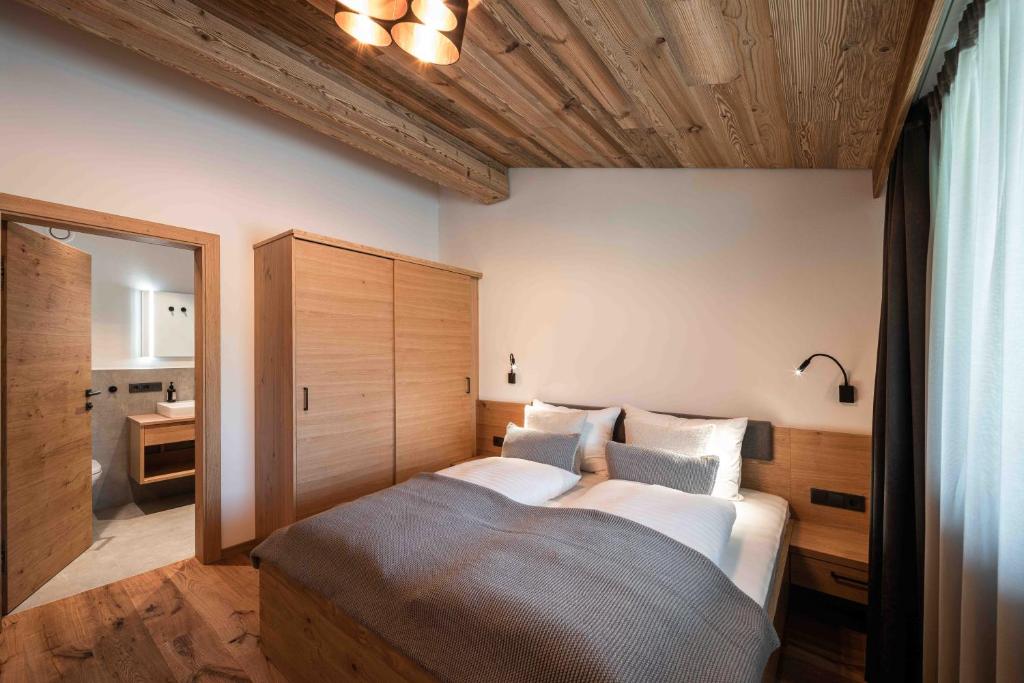 Posteľ alebo postele v izbe v ubytovaní Hohe Tauern Lofts Panoramabahn by Alpina-Holiday