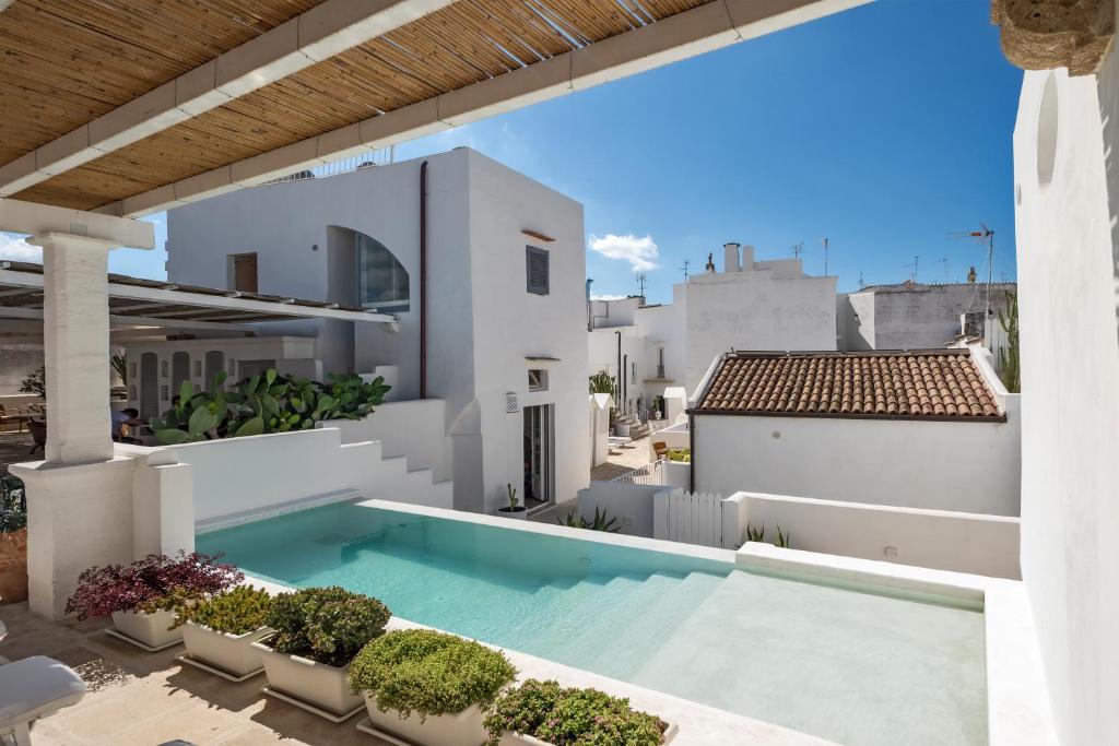 Piscina a Relais Corte Palmieri & Il Chiostro - Residenza d'epoca o a prop
