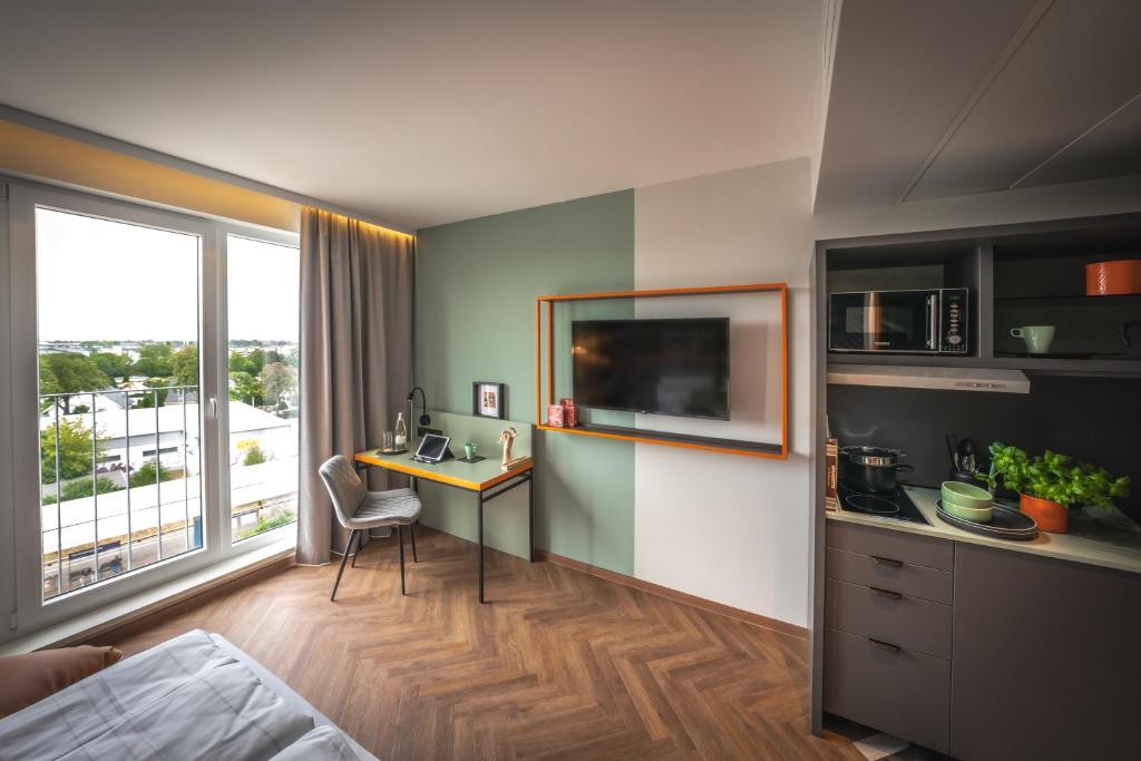 LOGINN Hotel Berlin Airport - Resim 17