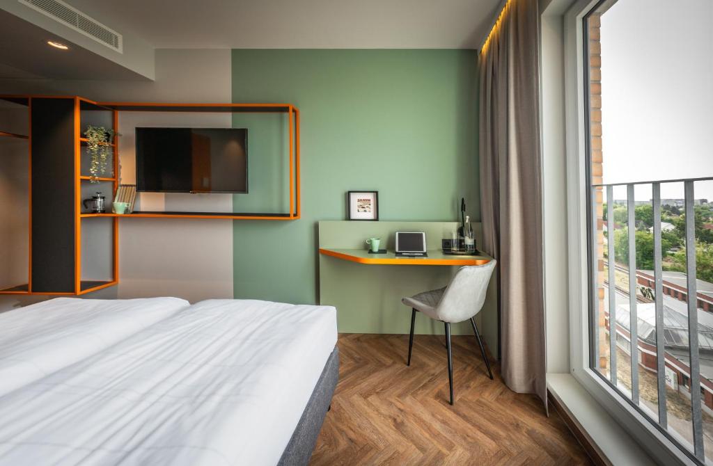 LOGINN Hotel Berlin Airport - Resim 25