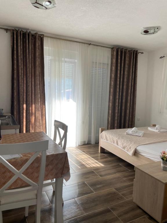 Postel nebo postele na pokoji v ubytování Apartman Ail 2