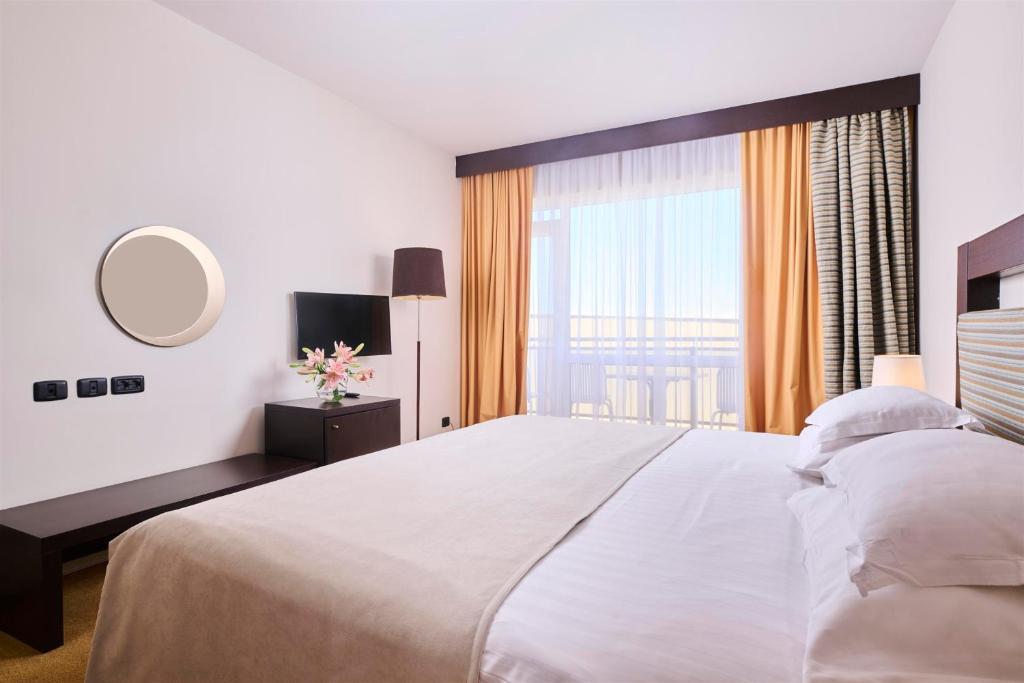 Postel nebo postele na pokoji v ubytování Hotel Garden Istra Plava Laguna