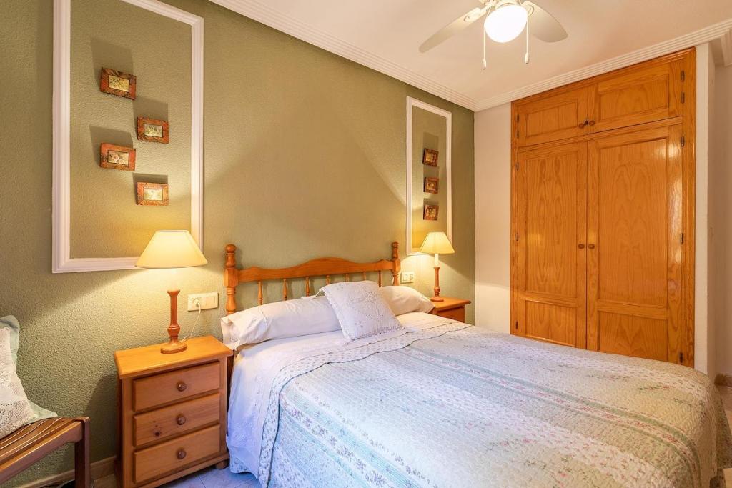 Postel nebo postele na pokoji v ubytování IDEAL para VERANO con PISCINA e INVIERNO con COCINA de LEÑA