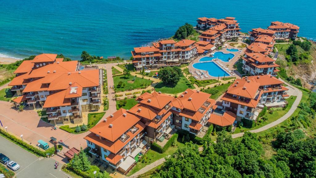 an aerial view of a resort by the ocean at Saint Thomas Holiday Village in Sozopol