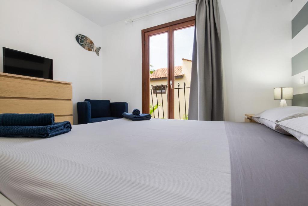 Postel nebo postele na pokoji v ubytování Gmar House relax y naturaleza