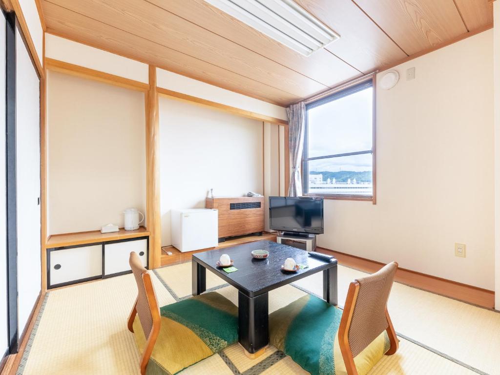 Posezení v ubytování Tabist Travel Inn Shinshu Nakano