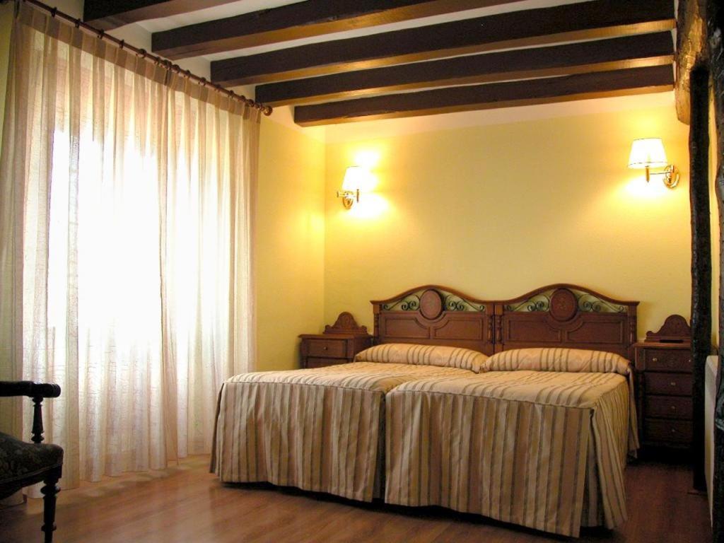 Postel nebo postele na pokoji v ubytování La Vieja Cantina