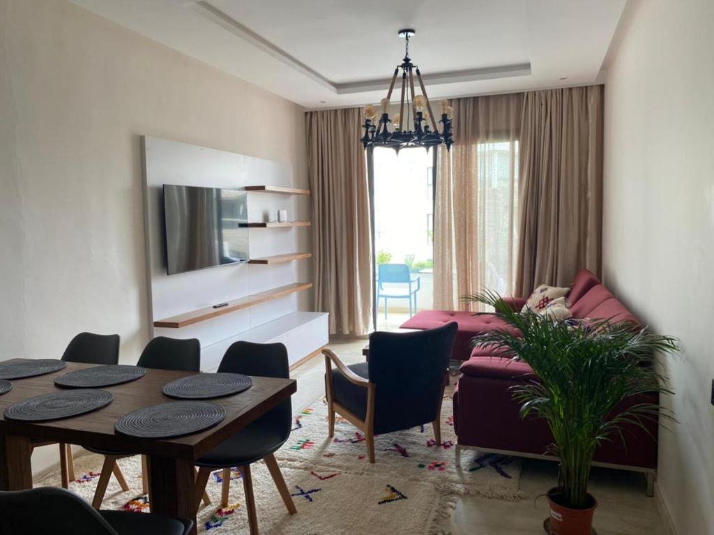 Posezení v ubytování Hivernage, Superbe appartement dans une résidence