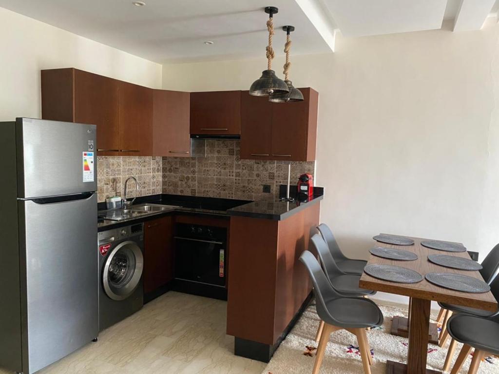 Kuchyň nebo kuchyňský kout v ubytování Hivernage, Superbe appartement dans une résidence