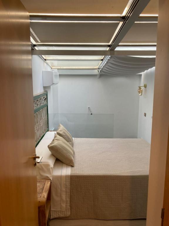 Postel nebo postele na pokoji v ubytování Room Tarifa
