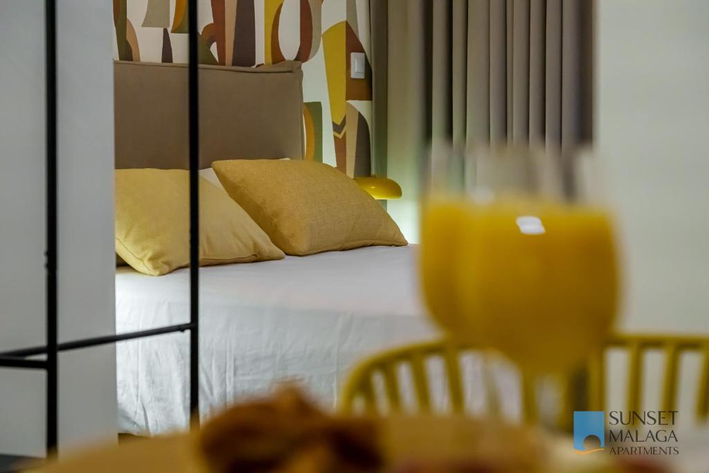 Posteľ alebo postele v izbe v ubytovaní MALAGA CENTRAL SUITES - New Release