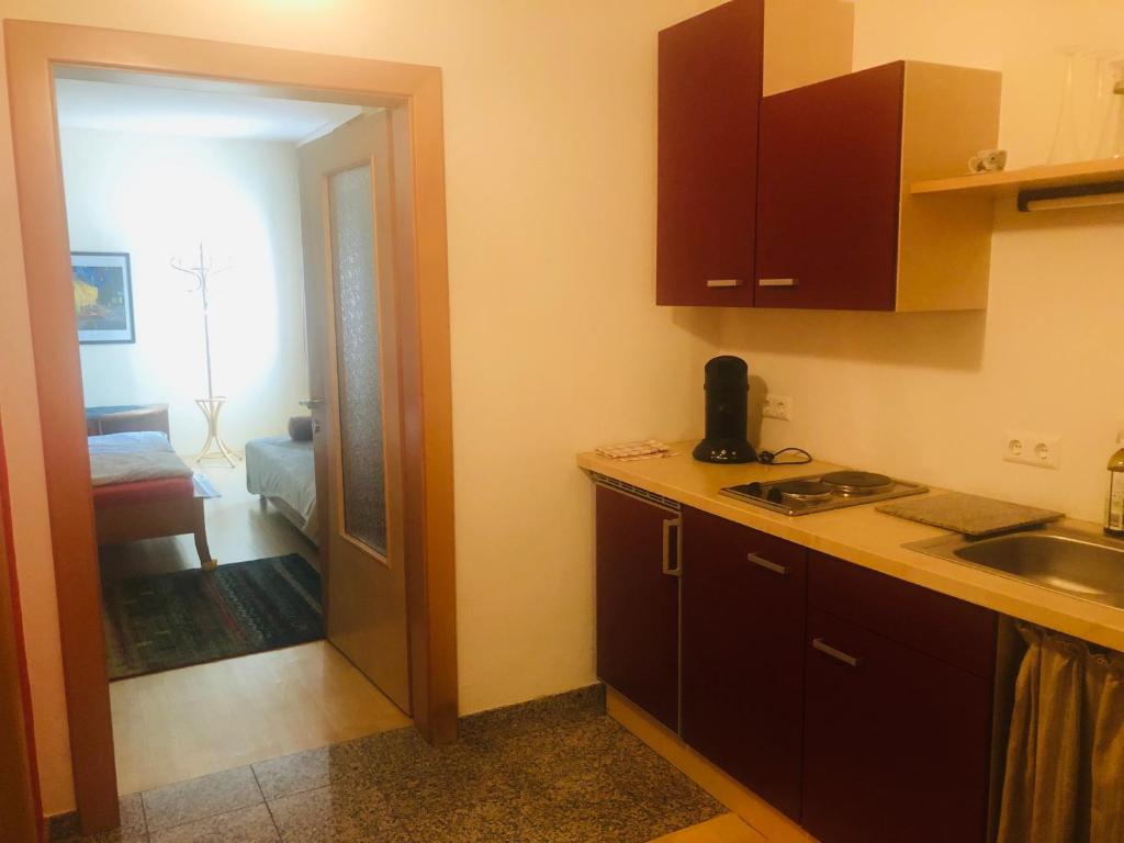 A kitchen or kitchenette at Ferienwohnung am Bauernhof Straßonig vulgo Hornis