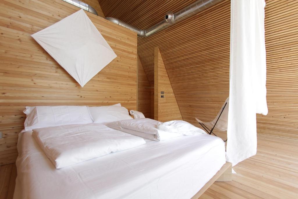 Postel nebo postele na pokoji v ubytování LILELO - Little Leisure Lodge