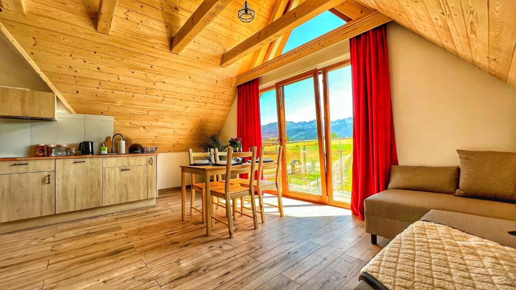 Kuchyňa alebo kuchynka v ubytovaní Apartamenty Widok Tatr