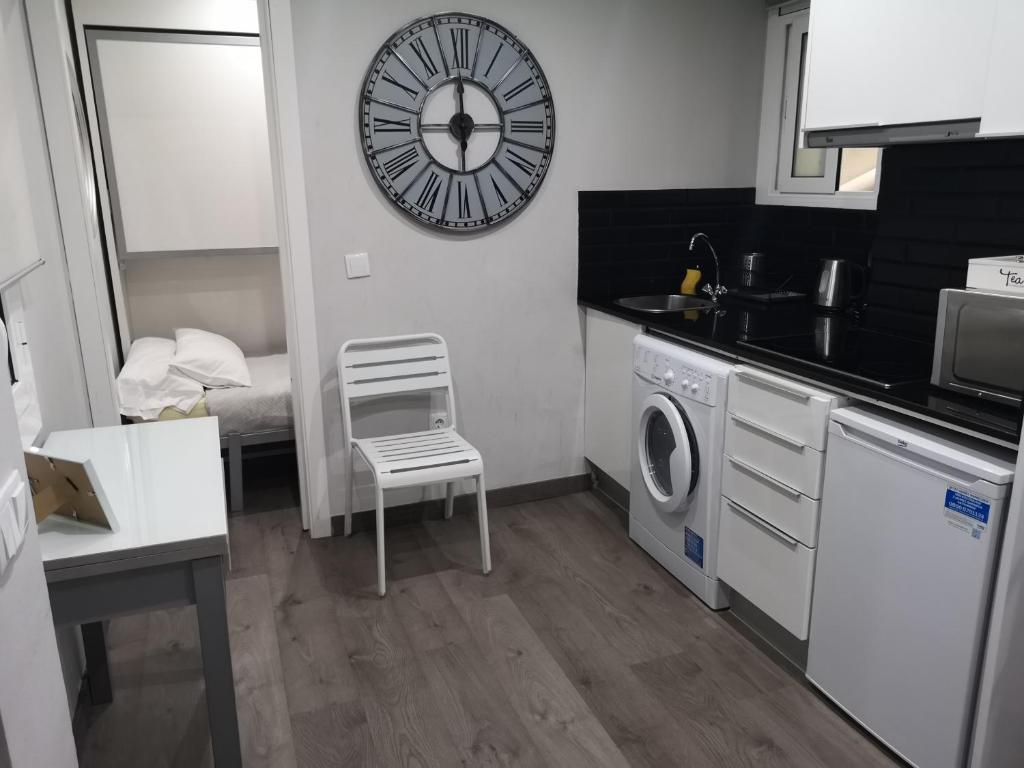 Kuchyňa alebo kuchynka v ubytovaní ApartEasy - Eixample Center