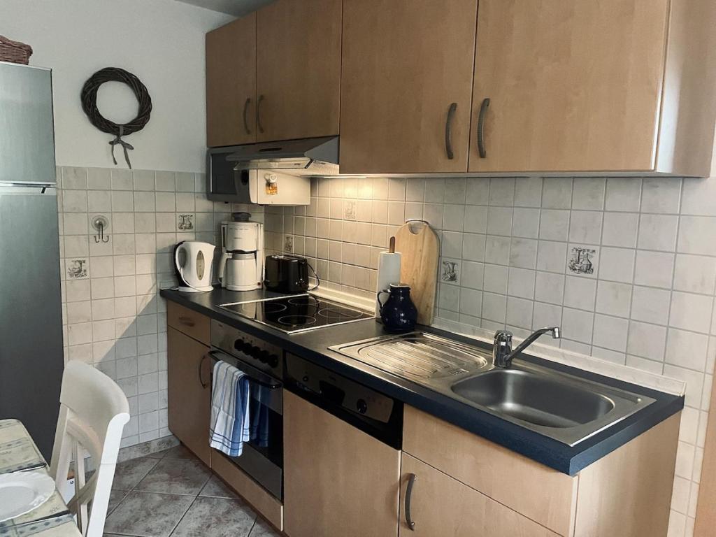 Virtuvė arba virtuvėlė apgyvendinimo įstaigoje Ferienwohnung Am Hasenberg