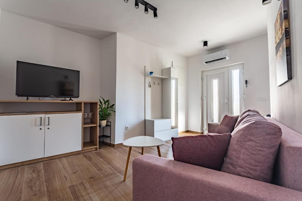 Telewizja i/lub zestaw kina domowego w obiekcie Royal place