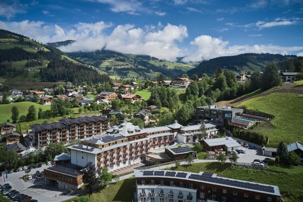 an aerial view of a town in the mountains at Sporthotel Wagrain in Wagrain