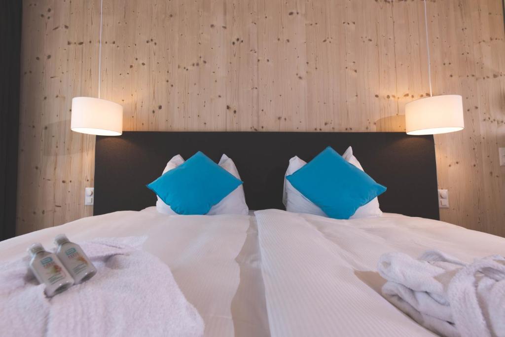 Postel nebo postele na pokoji v ubytování Bever Lodge