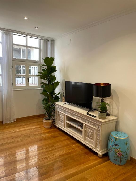A television and/or entertainment centre at A Das Marias GALLERY