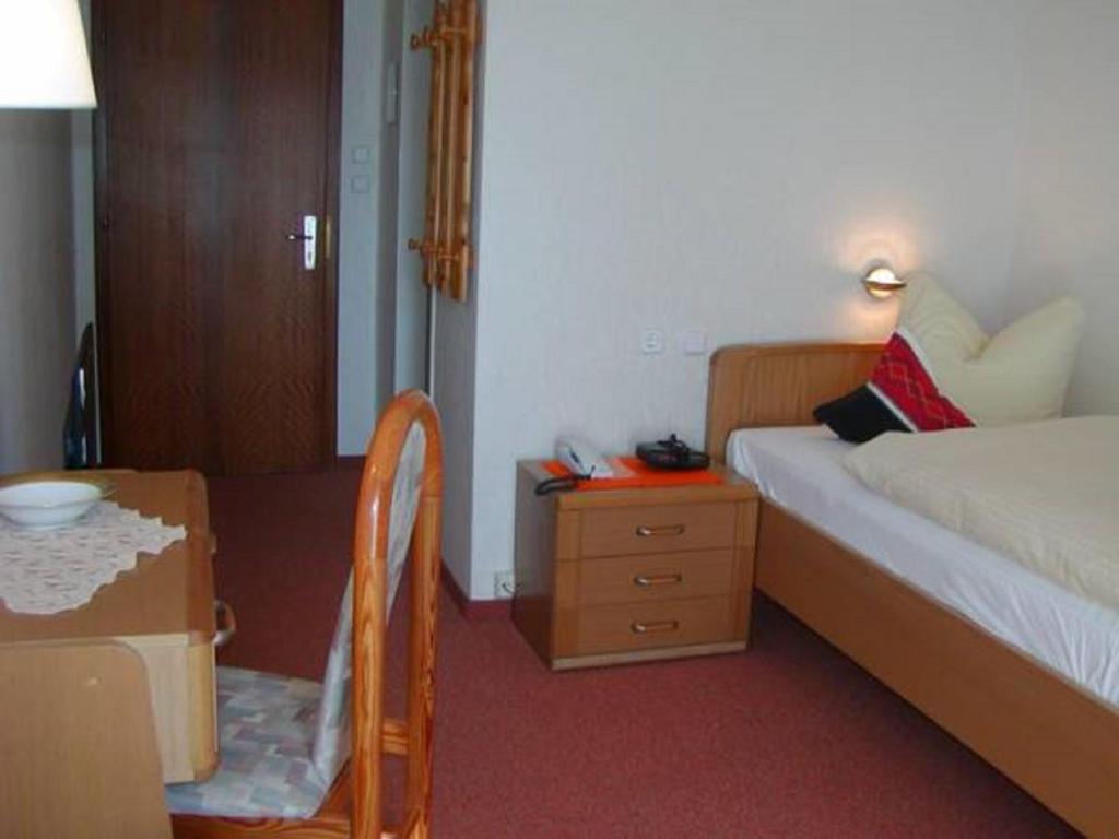 Postel nebo postele na pokoji v ubytování Kurhotel Eichwaldeck