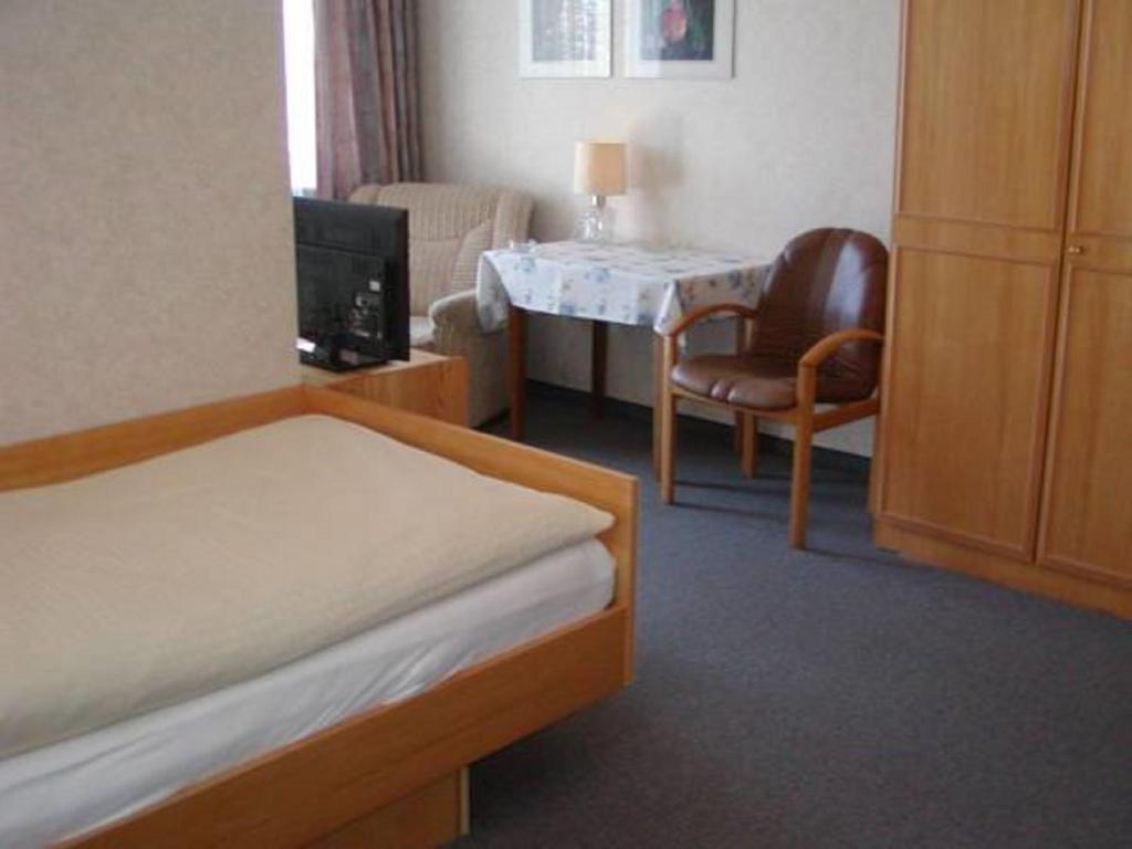 Postel nebo postele na pokoji v ubytování Kurhotel Eichwaldeck