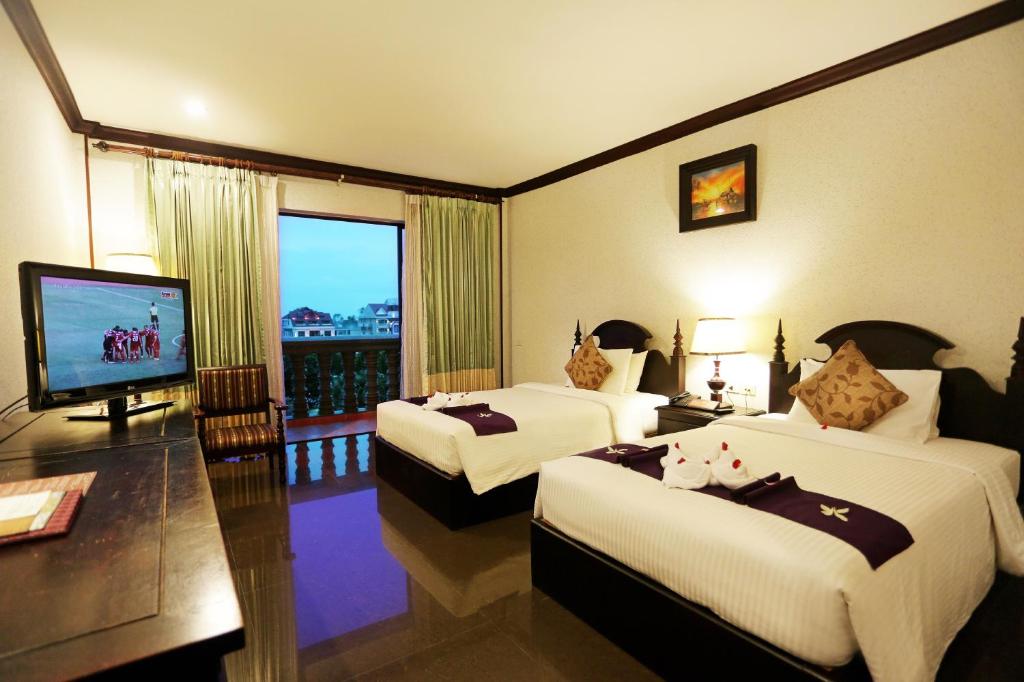 TV a/nebo společenská místnost v ubytování Lucky Angkor Hotel & Spa