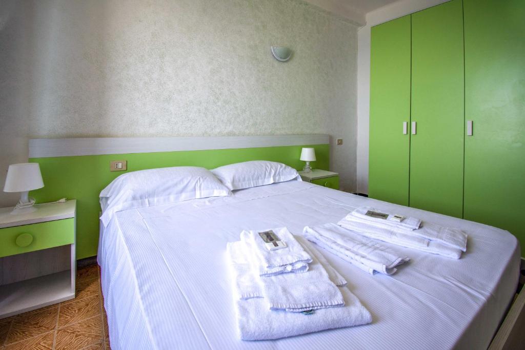 Postel nebo postele na pokoji v ubytování Hotel San Pietro Chiavari