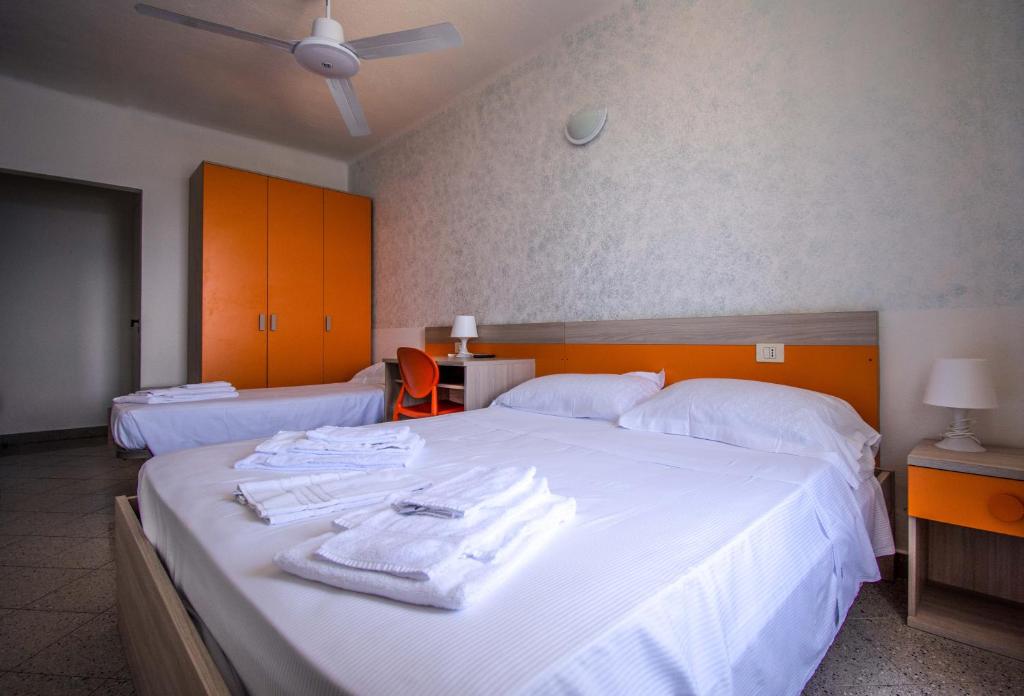 Postel nebo postele na pokoji v ubytování Hotel San Pietro Chiavari