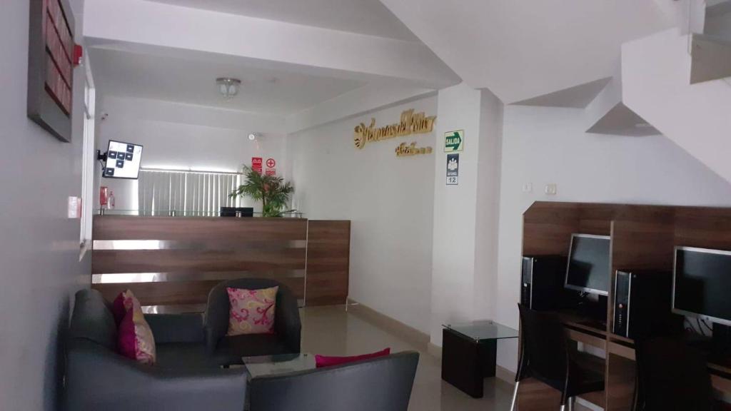 TV a/nebo společenská místnost v ubytování Hotel Terrazas Del Mar