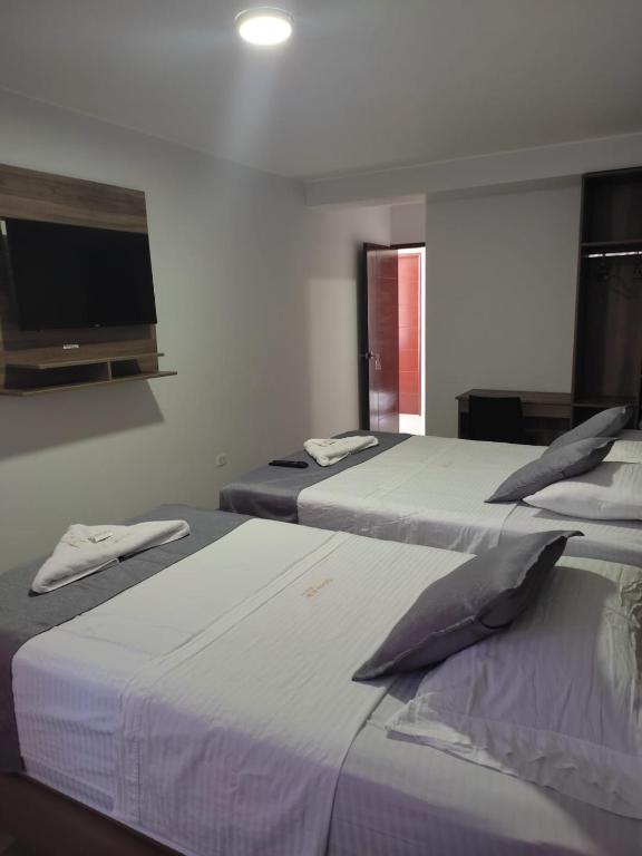 Postel nebo postele na pokoji v ubytování Hotel Terrazas Del Mar