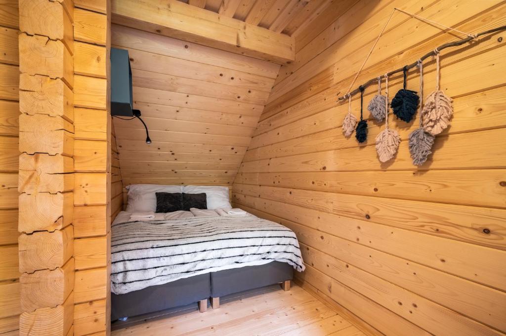 Postel nebo postele na pokoji v ubytování Dvě chalupy - Velké Karlovice