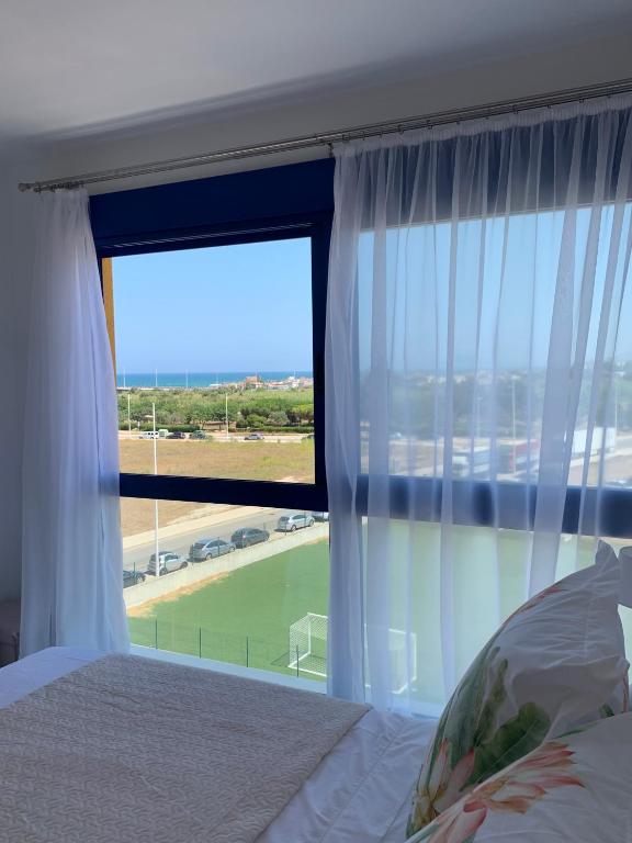 Postel nebo postele na pokoji v ubytování Apartamento duplex Mediterránean view