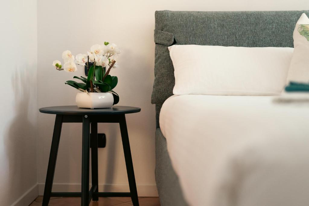 Łóżko lub łóżka w pokoju w obiekcie Residence Antico Torchio