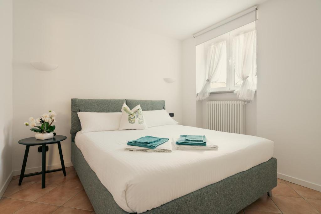 Łóżko lub łóżka w pokoju w obiekcie Residence Antico Torchio