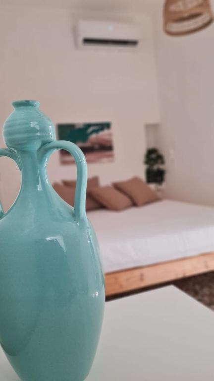 Łóżko lub łóżka w pokoju w obiekcie Dimora La Terrazza